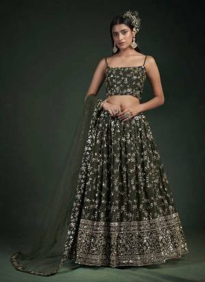 For A Designer Look,Grab These Lehenga Choli in Fine Colored.These Lehenga And Blouse Are Fabricated On Georgette Pair With Soft Net Dupatta.Its Beautified With Jari,Thread Embroidery Work.