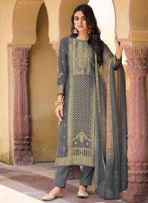 Grab These Suit in Fine Colored Pair With Bottom And Dupatta.These Top Are Silk Fabricated On Pair With Soft Silk Bottom And Chiffon Dupatta.Its Beautified With Wevon Designer,Khatli Hand Work,Digital Printed.