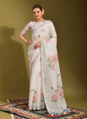 Attrective Look These Saree in Fine White Colored.These Saree And Blouse is Fabricated On Linen.Its Beautified With Designer Printed.