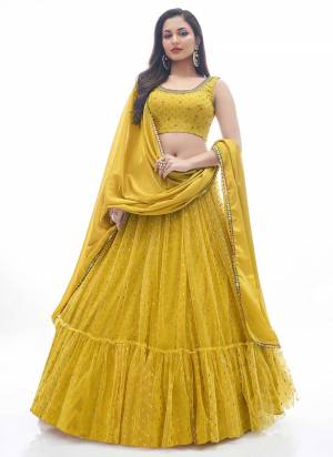 For A Designer Look,Grab These Lehenga Choli in Fine Colored.These Lehenga Are Soft Net And Blouse Are Fabricated On Art Silk Pair With Chinon Dupatta.Its Beautified With Thread Embroidery,Hand Work With Rubber Printed.