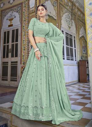 A Designer Look,Grab These Lehenga Choli in Fine Colored.These Lehenga And Blouse Are Fabricated On Georgette Pair With Georgette Dupatta.Its Beautified With Thread,Sequance Embroidery Work.