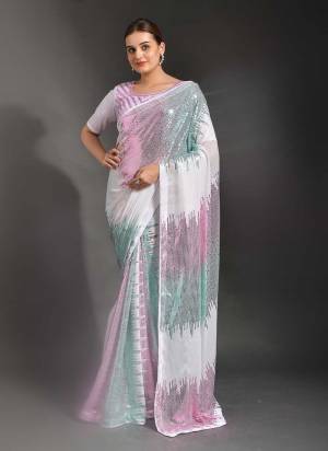 Attrective Look These Saree in Fine Colored.These Saree Are Georgette And Blouse is Art Silk Fabricated.Its Beautified With Designer Sequance Embroidery Work.