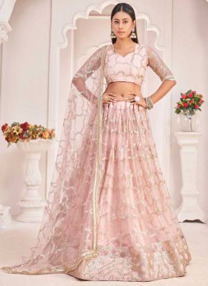 For A Different Look,Grab These Designer Lehenga in All Over Pretty Colored Pair With Blouse And Dupatta.These Lehenga Choli is All Over Butterfly Net Base Fabric With Designer Work.Buy Now These Lehenga For Up Coming Wedding Season.