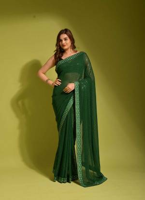 Grab These Saree in All Over Fine Colored Pair With Blouse.These Saree is Fabricated On Georgette Pair With  Satin Banglori Silk Blouse.Its Beautified With Sequance Embroidery And ,Swarovski Work Border.