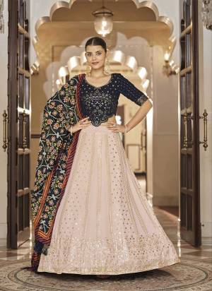 For A Designer Look,Grab These Lehenga Choli in Fine Colored.These Lehenga And Blouse Are Fabricated On Georgette Pair With Cotton Dupatta.Its Beautified With Sequance,Thread Embroidery Work,Printed.