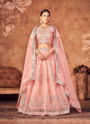 For A Designer Look,Grab These Lehenga Choli in Fine Colored.These Lehenga And Dupatta Are Fabricated On Organza Pair With Organza Blouse.Its Beautified With DesignerThread Embroidery Work.