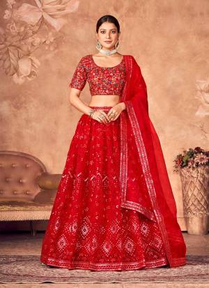 For A Designer Look,Grab These Lehenga Choli in Fine Colored.These Lehenga And Dupatta Are Fabricated On Organza Pair With Banglori Blouse.Its Beautified With DesignerThread Embroidery Work.