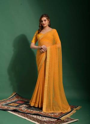 Attrective Look These Saree in Fine Colored.These Saree Are Chiffon And Blouse is Art Silk Fabricated.Its Beautified With Bandhani Printed, Embroidery Work Border,Blouse.