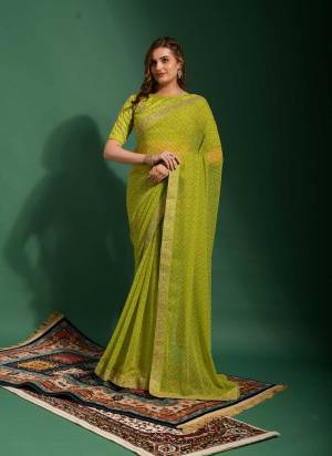 Attrective Look These Saree in Fine Colored.These Saree Are Chiffon And Blouse is Art Silk Fabricated.Its Beautified With Bandhani Printed, Embroidery Work Border,Blouse.