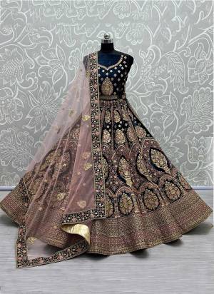 For A Designer Look,Grab These Lehenga Choli in Fine Colored.These Lehenga Choli Are Velvet And Dupatta Are Fabricated On Soft Net Pair.Its Beautified With Fancy Designer Multy Thread,Dori Embroidery Work.