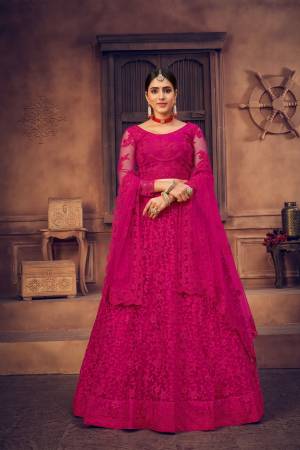 For A Designer Look,Grab These Lehenga Choli in Fine Colored.These Lehenga Choli Are Net And Dupatta Are Fabricated On Net Pair.Its Beautified With Fancy Designer Multy Thread Embroidery,Diamond Work.