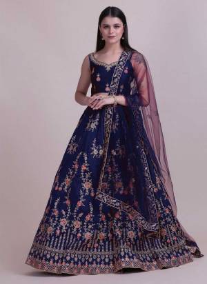 For A Designer Look,Grab These Lehenga Choli in Fine Colored.These Lehenga Choli Are Taffeta Silk And Dupatta Are Fabricated On Net Pair.Its Beautified With Fancy Designer Thread Embroidery,Stone Work.