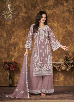 Grab These Plazzo Suit in Fine Colored Pair With Bottom And Dupatta.These Top And Dupatta Are Fabricated On Net Pair With Santoon Bottom.Its Beautified With Santoon Inner.Its Beautified With Heavy Designer Thread Embroidery Work.