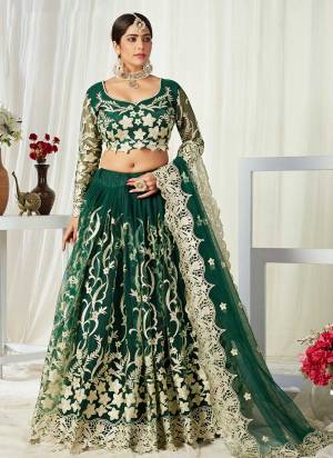 For A Designer Look,Grab These Lehenga Choli in Fine Colored.These Lehenga And Blouse Are Fabricated On Net Pair With Net Dupatta.Its Beautified With Designer Cut Work,Badla Embroidery Work.