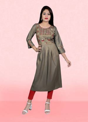 Attrective This Readymade Long Kurti In Fine Color Fabricated On Two Tone Rayon Beautified With Designer Embroidery Work. It Is Light In Weight And Easy To Carry All Day Long. 