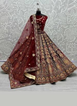 For A Designer Look,Grab These Lehenga Choli in Fine Colored.These Lehenga Choli Are Velvet And Dupatta Are Fabricated On Soft Net Pair.Its Beautified With Fancy Designer Multy Thread,Dori Embroidery Work.