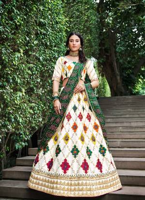 For A Designer Look,Grab These Lehenga Choli in Fine Colored.These Lehenga And Blouse Are Fabricated On Silk Pair With Gajji Silk Dupatta.Its Beautified With Thread,Sequance Embroidery Work And Printed Dupatta.