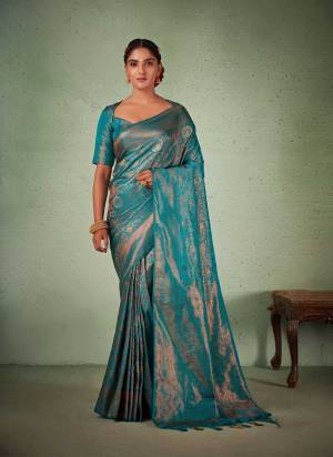 Attrective These Festive Wear Saree in Fine Colored.These Saree And Blouse is Fabricated On Kanjivaram Silk.Its Beautified With Weavon Copper Jari Designer.