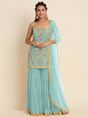 Attrective These Sharara Suit in Fine Colored Pair With Bottom And Dupatta.These Top And Bottom Are Georgette And Pair With Net Dupatta.Its Beautified With Santoon Inner.Its Beautified With Heavy Designer Multy Thread Embroidery Work.