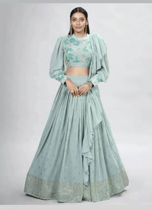 For A Designer Look,Grab These Lehenga Choli in Fine Colored.These Lehenga And Blouse Are Fabricated On Georgette Pair With Georgette Dupatta.Its Beautified With Designer Thread,Sequance Embroidery,Mukaish Work.