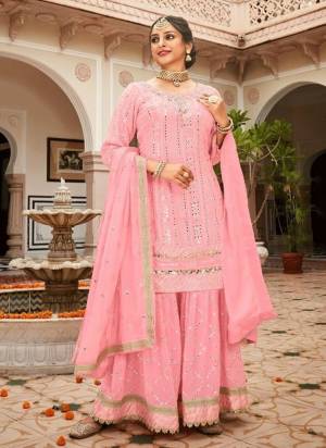 Attrective These Sharara Suit in Fine Colored Pair With Bottom And Dupatta.These Top Are Georgette And Dupatta Are Fabricated On Georgette Pair With Georgette Bottom.Its Beautified With Santoon Inner.Its Beautified With Heavy Designer Sequance Embroidery Work.