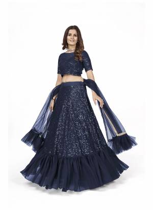 For A Designer Look,Grab These Lehenga Choli in Fine Colored.These Lehenga And Blouse Are Fabricated On Georgette Pair With Soft Net Dupatta.Its Beautified With Heavy Multy Sequance Embroidery Work.