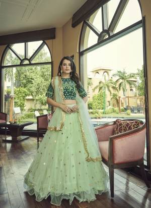 For A Designer Look,Grab These Lehenga Choli in Fine Colored.These Lehenga And Dupatta Are Fabricated On Nylone Net Pair With Kumkum Silk Blouse.Its Beautified With Heavy Thread, Sequance Embroidery Work.