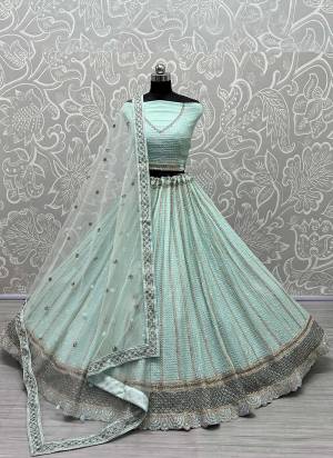 For A Designer Look,Grab These Lehenga Choli in Fine Colored.These Lehenga Choli Are Georgette And Dupatta Are Fabricated On Soft Net Pair.Its Beautified With Fancy Designer Multy Thread,Sequance,Dori Embroidery,Zarkan Work.