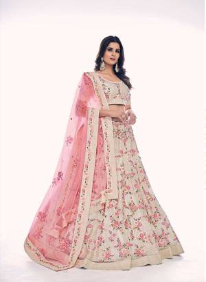 For A Designer Look,Grab These Lehenga Choli in Fine Colored.These Lehenga And Blouse Are Fabricated On Soft Net Pair With Soft Net Dupatta.Its Beautified With Designer Dori,Thread,Sequance Embroidery,Zarkan Work.