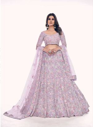 For A Designer Look,Grab These Lehenga Choli in Fine Colored.These Lehenga And Blouse Are Fabricated On Soft Net Pair With Soft Net Dupatta.Its Beautified With Designer Dori,Thread,Sequance Embroidery,Zarkan Work.