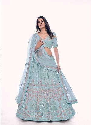 For A Designer Look,Grab These Lehenga Choli in Fine Colored.These Lehenga And Blouse Are Fabricated On Soft Net Pair With Soft Net Dupatta.Its Beautified With Designer Dori,Thread,Sequance Embroidery,Zarkan Work.