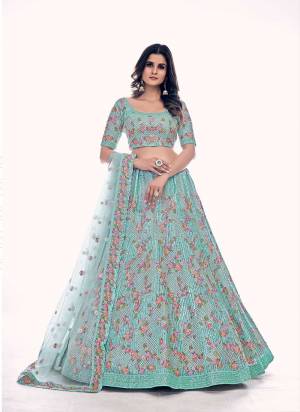 For A Designer Look,Grab These Lehenga Choli in Fine Colored.These Lehenga And Blouse Are Fabricated On Soft Net Pair With Soft Net Dupatta.Its Beautified With Designer Dori,Thread,Sequance Embroidery,Zarkan Work.