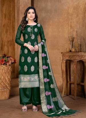 Grab These Suit in Fine Colored Pair With Bottom And Dupatta.These Top And Dupatta Are Fabricated On Banarasi Silk Pair With Santoon Bottom.Its Beautified With Santoon Inner.Its Beautified With Heavy Wevon Designer Work.