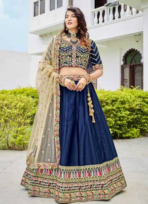 For A Designer Look,Grab These Lehenga Choli in Fine Colored.These Lehenga And Blouse Are Fabricated On Ferrari Silk Pair With Butterfly Net Dupatta.Its Beautified With Designer Multy Thread,Sequance Embroidery Work.