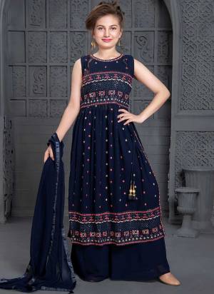 For A Designer Look,Grab These Kidswear Readymade Sharara Suits in Fine Colored.These Top And Bottom Are Fabricated On Georgette Pair With Georgette Dupatta.Its Beautified With Designer Embroidery Work.