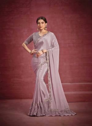 Look Attrective These Party Wear Saree in Fine Colored.These Saree Are Crepe Silk Georgette And Blouse  is Fabricated On Raw Silk.Its Beautified With Heavy Designer Embroidery Work.