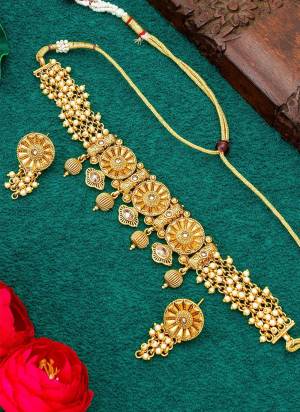 Grab These Beautifil Gold Colored Necklace.These Necklace is Come Copper Material And Beautified With Temple Work.