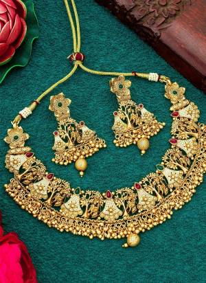 Grab These Beautifil Gold Colored Necklace.These Necklace is Come Copper Material And Beautified With Temple Work.