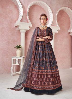 For A Designer Look,Grab These Readymade Gown With Dupatta in Fine Colored.These Gown Are Fabricated On Dola Silk Pair With Net Dupatta.Its Beautified With Designer Digital Printed With Sequance Embroidery Work.