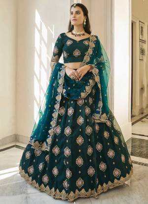 For A Designer Look,Grab These Lehenga Choli in Fine Colored.These Lehenga And Blouse Are Fabricated On Organza Pair With Butterfly Net Dupatta.Its Beautified With Heavy Jari,Thread, Sequance Embroidery Work.