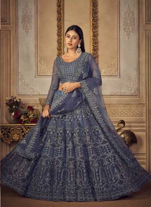 For A Different Look,Grab These Bridal Designer Lehenga in All Over Pretty Colored Pair With Blouse And Dupatta.These Lehenga Choli is All Over Net Base Fabric With Designer Cording Embroidery,Stone Work.Buy Now These Lehenga For Up Coming Wedding Season.