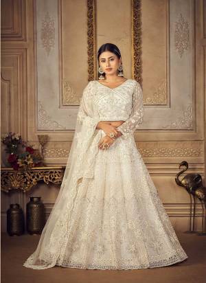 For A Different Look,Grab These Bridal Designer Lehenga in All Over Pretty Colored Pair With Blouse And Dupatta.These Lehenga Choli is All Over Net Base Fabric With Designer Cording Embroidery,Stone Work.Buy Now These Lehenga For Up Coming Wedding Season.