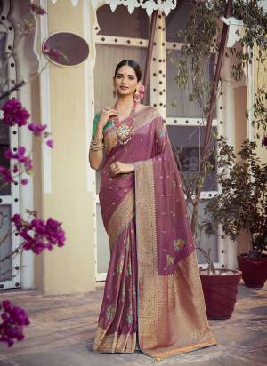 Attrective These Party Wear Saree in Fine Colored.These Saree And Blouse is Fabricated On Art Silk.Its Beautified With Heavy Weaving Meenakari Designer.