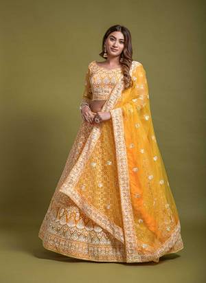 For A Designer Look,Grab These Lehenga Choli in Fine Colored.These Lehenga Choli Are Bridal Net And Dupatta Are Fabricated On Soft Net Pair.Its Beautified With Fancy Designer Multy Thread,Sequance Embroidery Work.