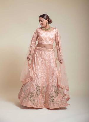 For A Designer Look,Grab These Lehenga Choli in Fine Colored.These Lehenga Choli Are Bridal Net And Dupatta Are Fabricated On Soft Net Pair.Its Beautified With Fancy Designer Multy Thread,Sequance Embroidery Work.