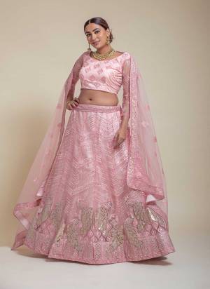 For A Designer Look,Grab These Lehenga Choli in Fine Colored.These Lehenga Choli Are Bridal Net And Dupatta Are Fabricated On Soft Net Pair.Its Beautified With Fancy Designer Multy Thread,Sequance Embroidery Work.