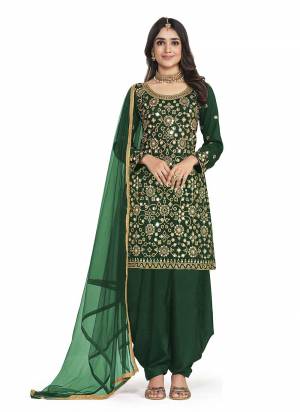 Attrective These Patiyala Suit in Fine Colored Pair With Bottom And Dupatta.These Top Are Art Silk And Dupatta Are Net And Pair With Santoon Bottom.Its Beautified With Santoon Inner.Its Beautified With Heavy Designer Mirror Embroidery Work.