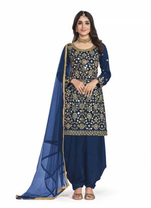 Attrective These Patiyala Suit in Fine Colored Pair With Bottom And Dupatta.These Top Are Art Silk And Dupatta Are Net And Pair With Santoon Bottom.Its Beautified With Santoon Inner.Its Beautified With Heavy Designer Mirror Embroidery Work.