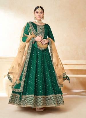 Grab These Anarkali Suit in Fine Colored Pair With Bottom And Dupatta.These Top Are Tafetta Silk And Dupatta Are Fabricated On Net Pair With Santoon Bottom.Its Beautified With Santoon Inner.Its Beautified With Wevon Butti Designer With Embroidery Work.