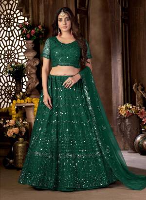 For A Designer Look,Grab These Lehenga Choli in Fine Colored.These Lehenga And Blouse Are Fabricated On Net Pair With Net Dupatta.Its Beautified With Foil Mirror,Multy Embroidery Work.